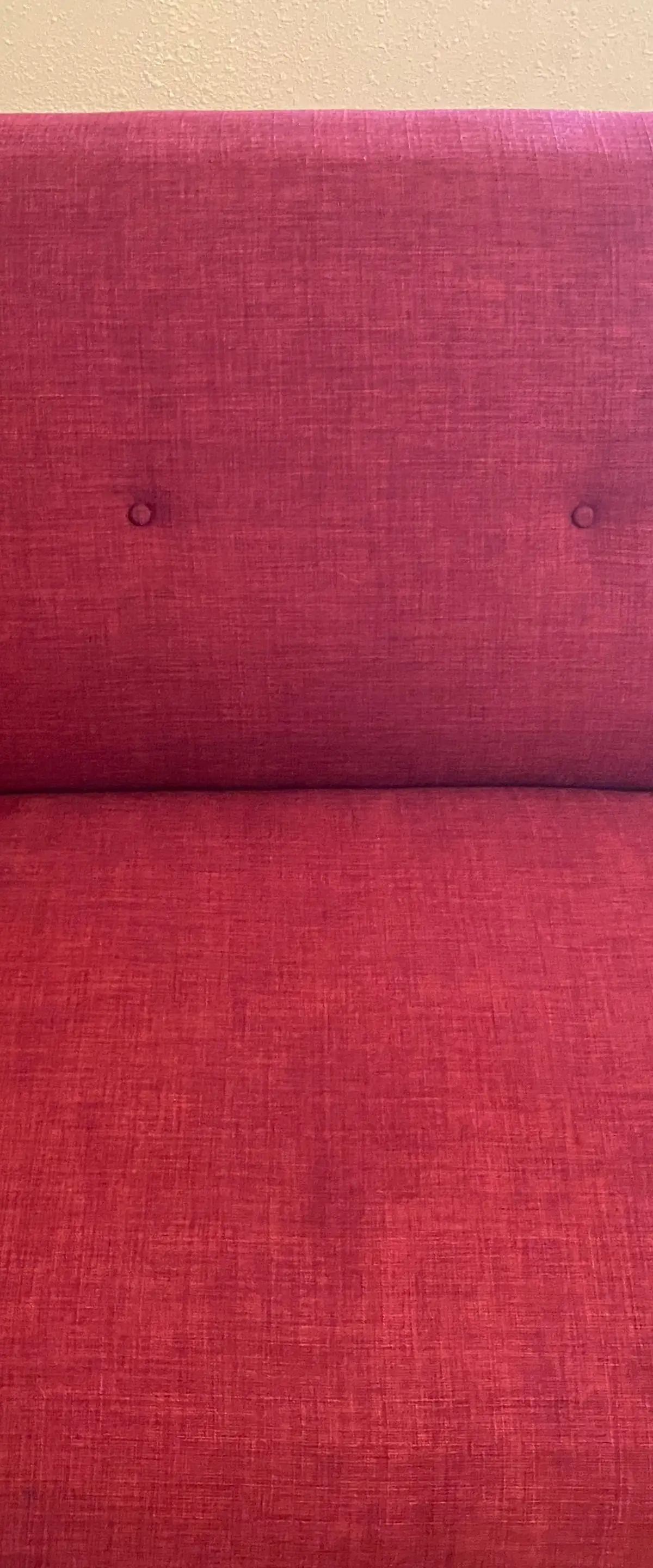 Upholstered sofa, body-oil staining — after