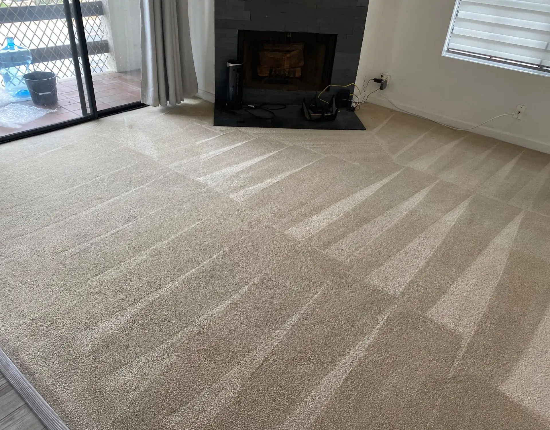 Living room carpet in a San Diego home after hot-water extraction cleaning