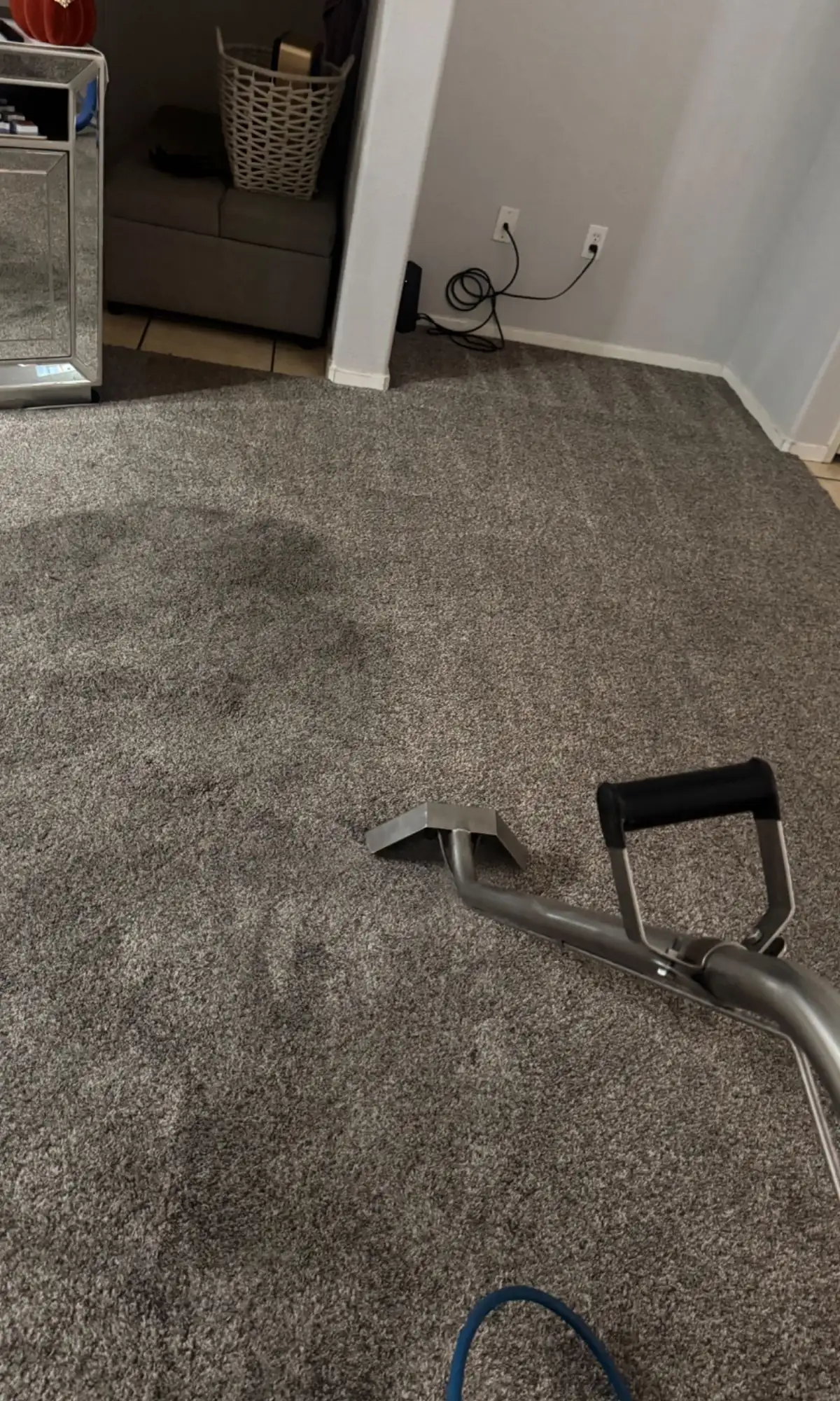 Hot-water extraction in progress on a San Diego living room carpet